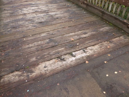 Transition from hard surface to wooden bridge at Klineline Ponds – railing on bridge over Salmon Creek